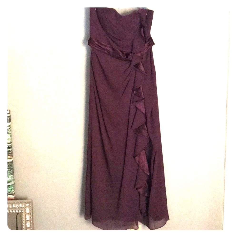 Deep purple, strapless evening gown.